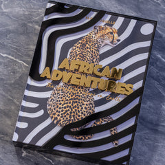 Livro African Adventures: The Greatest Safari on Earth – Edição Especial com Case em Acrílico